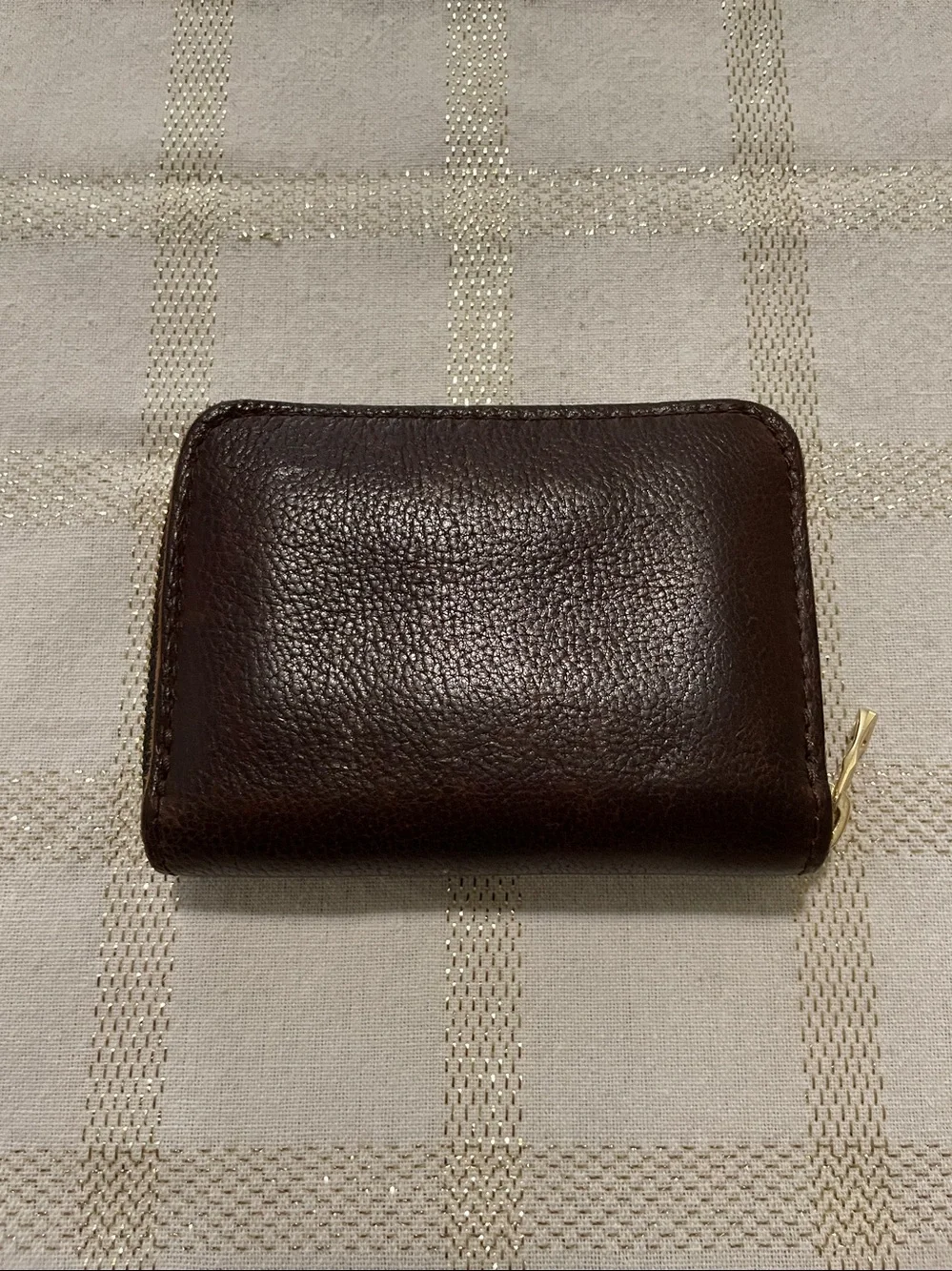 Portland Leather Goods brown wallet, gold tone zipper, inside holds coins/cards